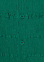A detail shot of the HaaT KYO CHIJIMI TSUCHIKABE cardigan.