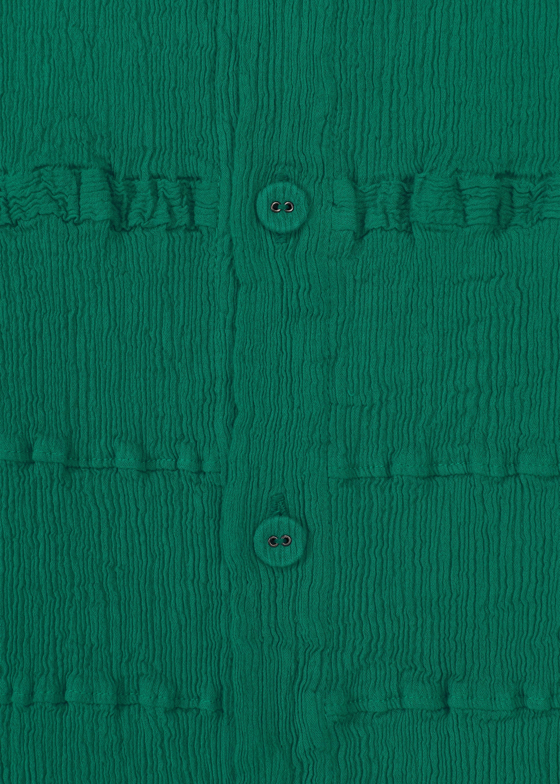 A detail shot of the HaaT KYO CHIJIMI TSUCHIKABE cardigan.