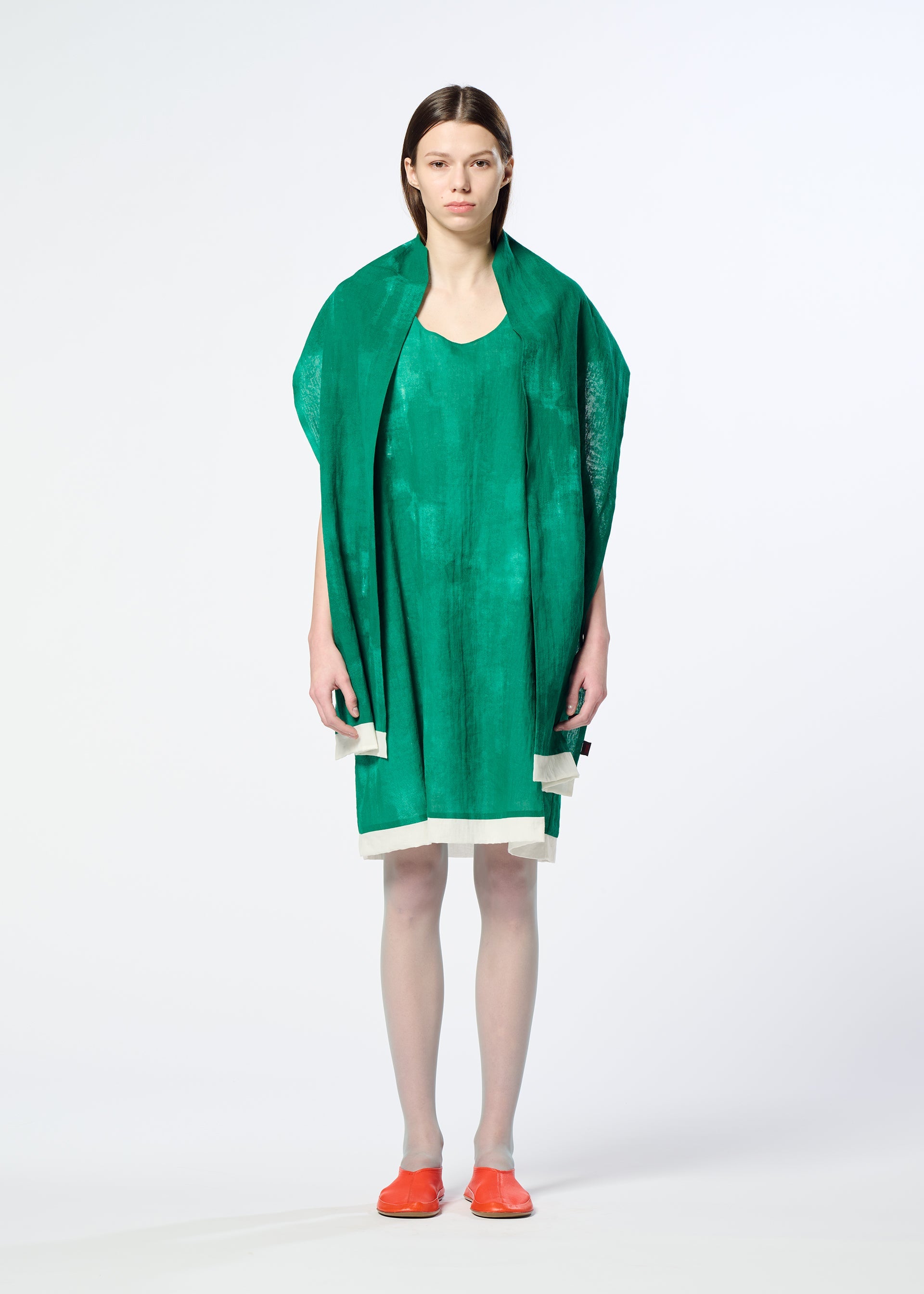 A model wears the HaaT WALL WHITE HEM tunic.