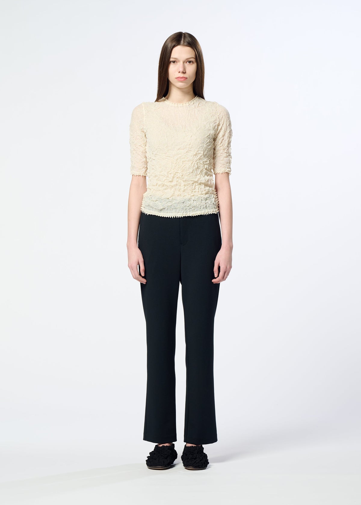 A model wears the HaaT PONTE JERSEY trousers.