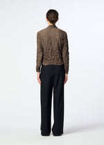 A model wears the HaaT KUMO SHIBORI kumo-shibori-cardigan-black.