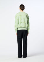 A model wears the HaaT RIBBON KNIT ribbon-knit-top-grey.