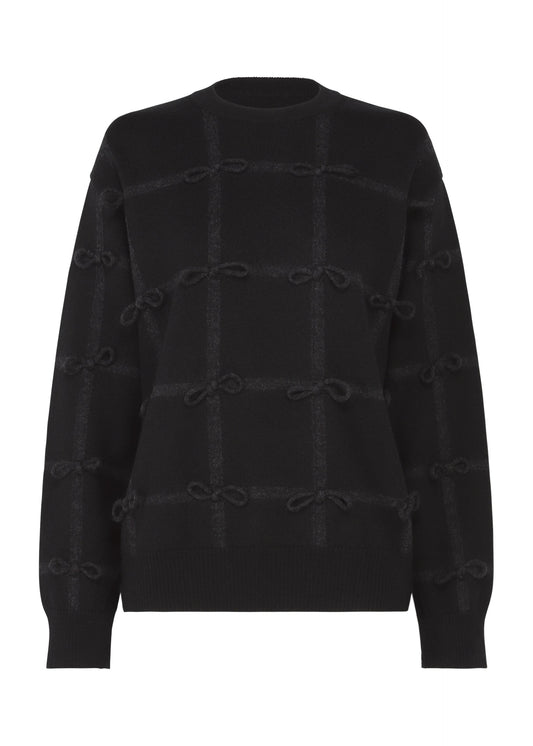 A product shot of the HaaT RIBBON KNIT top in black.