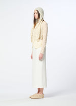 A model wears the HaaT KUMO SHIBORI KNIT SHEER cardigan.