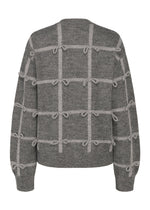 A detail shot of the HaaT RIBBON KNIT cardigan.