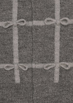 A detail shot of the HaaT RIBBON KNIT cardigan.