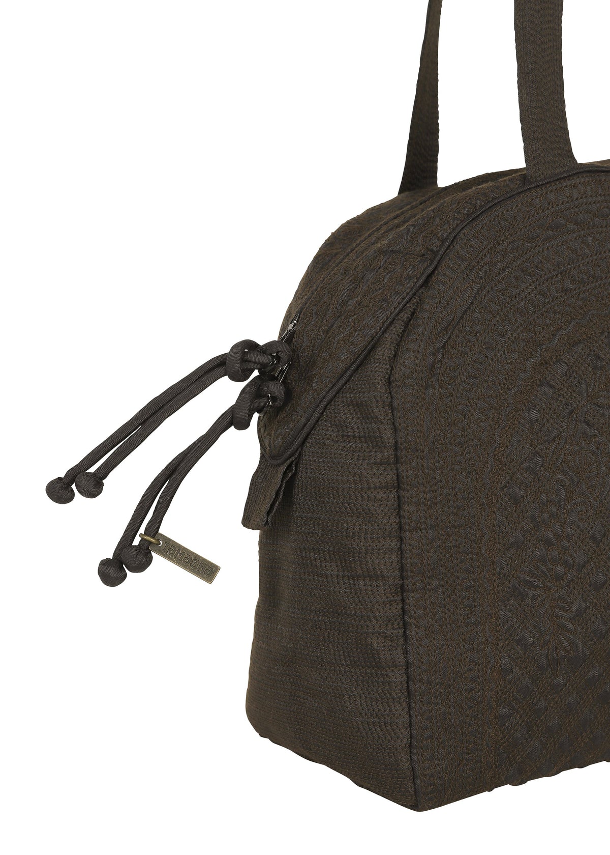 A detail shot of the HaaT BLOOM & PLAID BOSTON handbag.