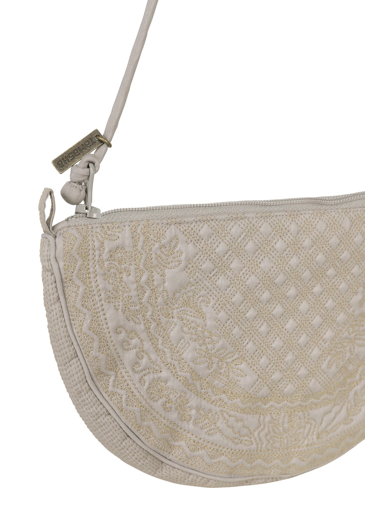 A detail shot of the HaaT BLOOM & PLAID BOSTON handbag.