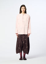 A model wears the HaaT MULMUL BHILL mulmul-bhill-trousers-walnut-brown.