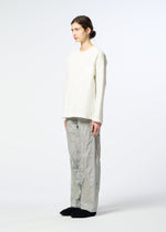 A model wears the HaaT DELICATE FLORAL BHILL delicate-floral-bhill-trousers-almost-black.
