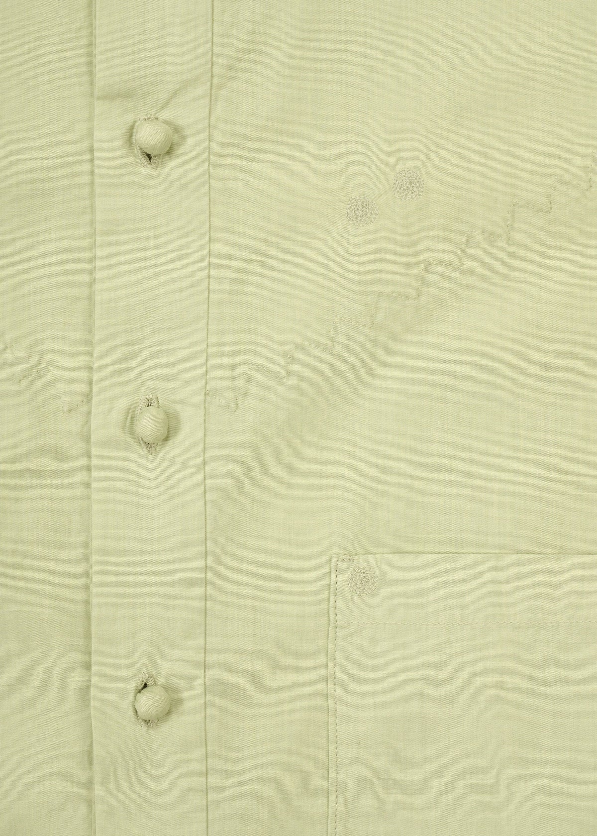 A detail shot of the HaaT KANGRI POCKET DOT shirt.