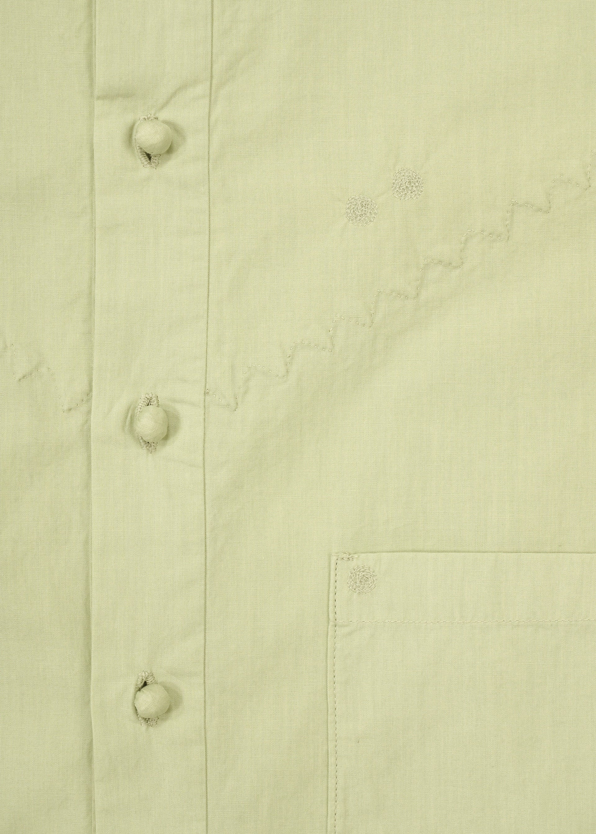 A detail shot of the HaaT KANGRI POCKET DOT shirt.