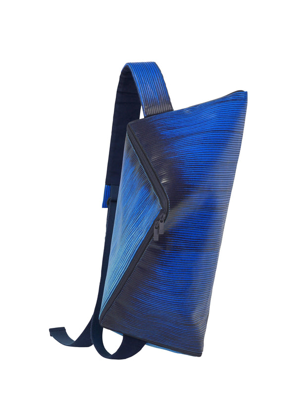 A product shot of the HOMME PLISSÉ ISSEY MIYAKE RB_ALL OVER LAYER PRINT BAG bag in blue (72).