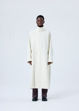 A model wears the HOMME PLISSÉ ISSEY MIYAKE  RB_DRAWING COAT coat