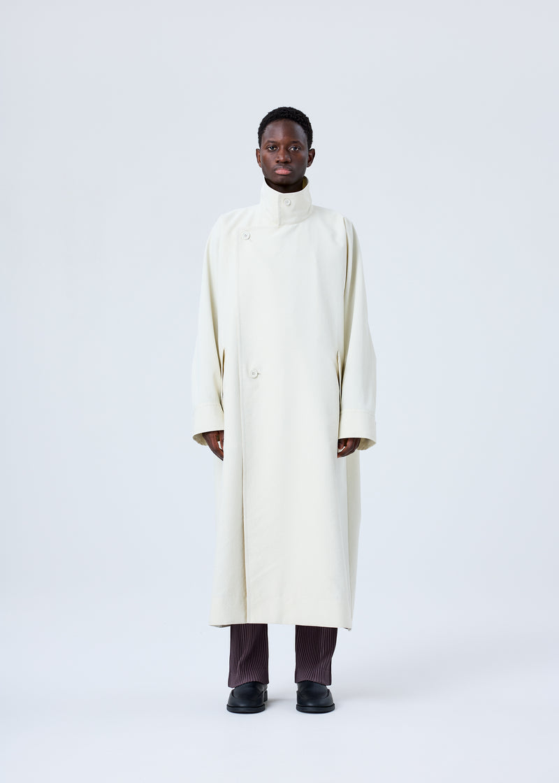 A model wears the HOMME PLISSÉ ISSEY MIYAKE  RB_DRAWING COAT coat