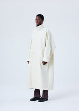 A model wears the HOMME PLISSÉ ISSEY MIYAKE  RB_DRAWING COAT coat