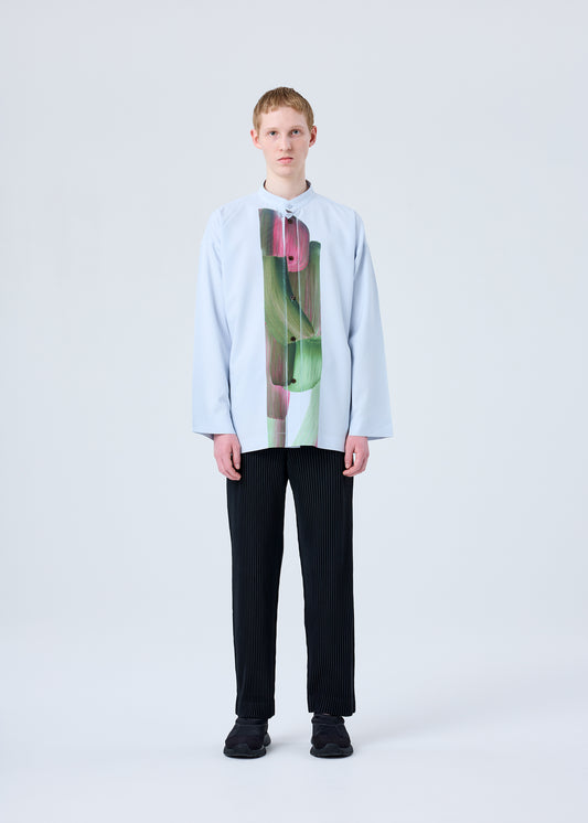 A model wears the HOMME PLISSÉ ISSEY MIYAKE RB_DRAWING PRESS SHIRT 1 shirt