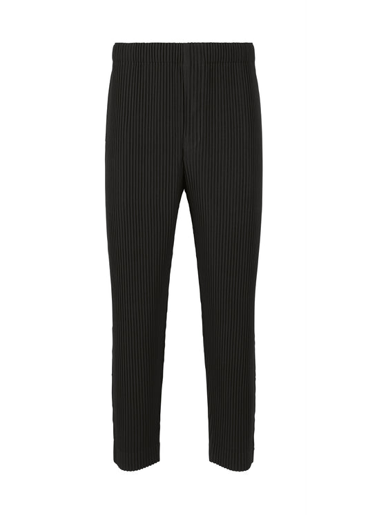 A product shot of the HOMME PLISSÉ ISSEY MIYAKE MC AUGUST trousers in black (15)