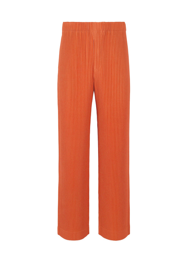 A product shot of the HOMME PLISSÉ ISSEY MIYAKE MC OCTOBER trousers in grapefruit orange (33).