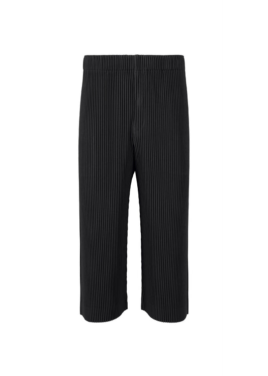 A product shot of the HOMME PLISSÉ ISSEY MIYAKE  PLEATS BOTTOMS 1 trousers in black (15)