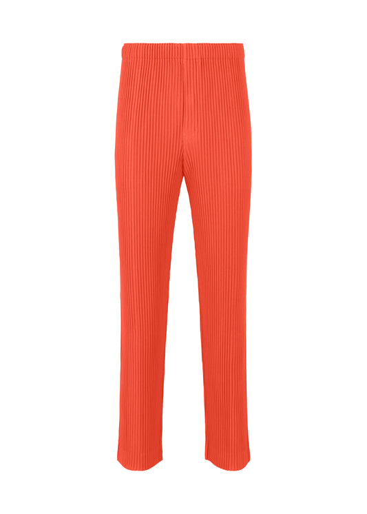 A product shot of the HOMME PLISSÉ ISSEY MIYAKE  PLEATS BOTTOMS 1 trousers in salmon red (27)