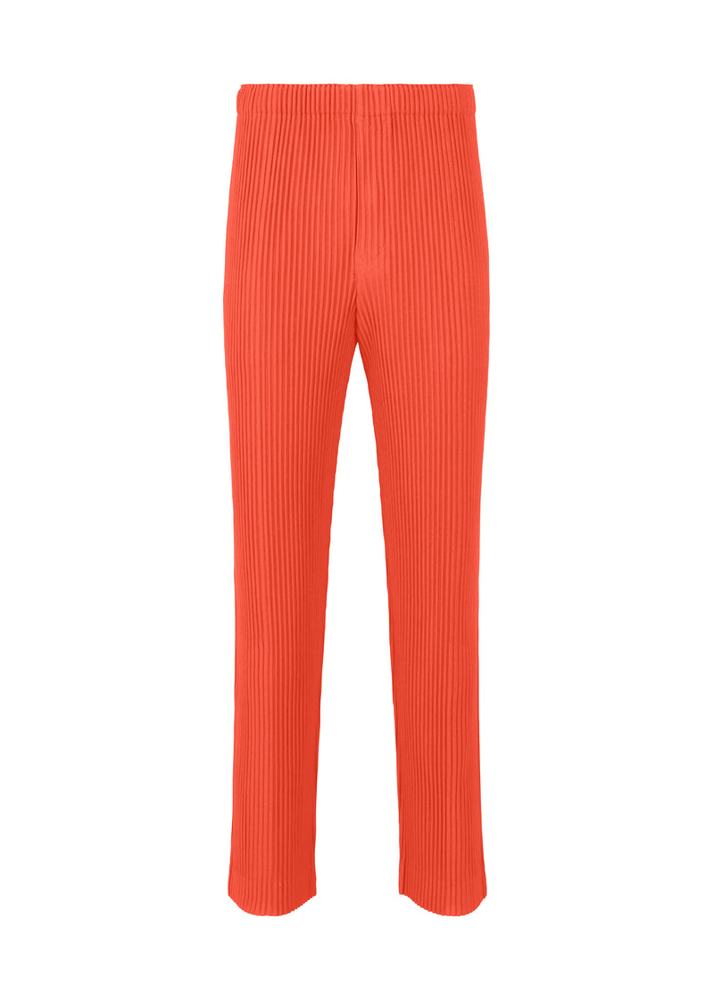 A product shot of the HOMME PLISSÉ ISSEY MIYAKE  PLEATS BOTTOMS 1 trousers in salmon red (27)