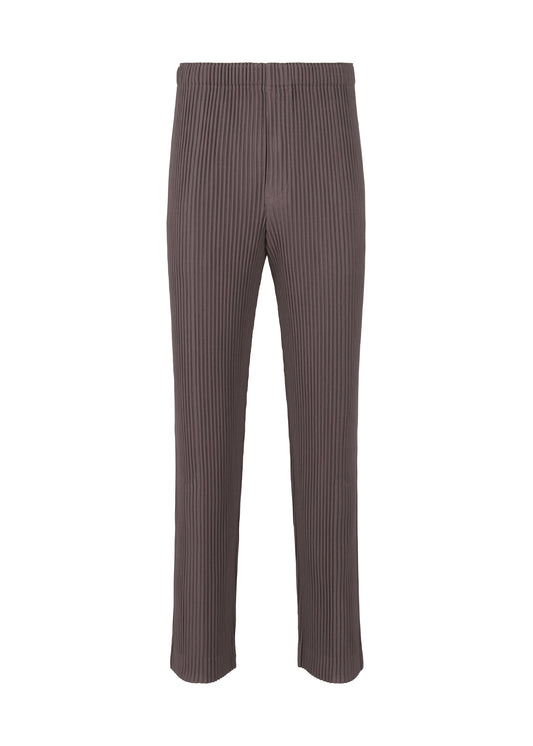 A product shot of the HOMME PLISSÉ ISSEY MIYAKE  PLEATS BOTTOMS 1 trousers in slate violet (83)