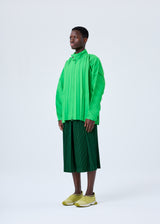 A model wears the HOMME PLISSÉ ISSEY MIYAKE TAILORED PLEATS 1 shorts