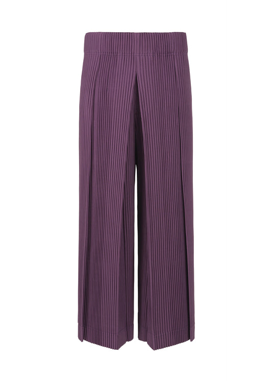 A product shot of the HOMME PLISSÉ ISSEY MIYAKE  TUCKED trousers in dark purple (85)