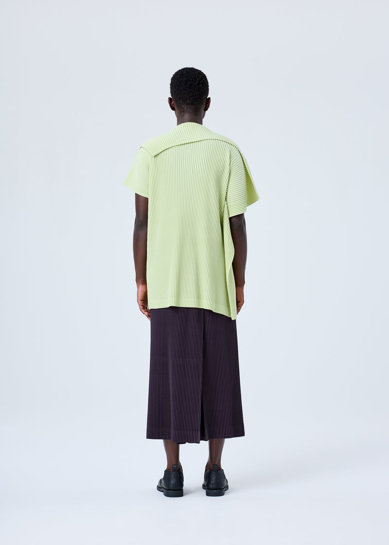 A model wears the HOMME PLISSÉ ISSEY MIYAKE RB_COLOR PALETTE 1 trousers