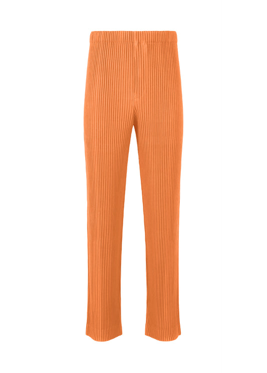 A product shot of the HOMME PLISSÉ ISSEY MIYAKE RB_COLOR PALETTE 1 trousers in carrot orange (34)