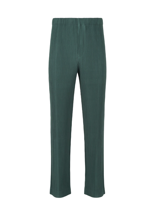 A product shot of the HOMME PLISSÉ ISSEY MIYAKE RB_COLOR PALETTE 1 trousers in dark green (69)