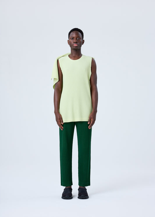 A model wears the HOMME PLISSÉ ISSEY MIYAKE RB_COLOR PALETTE 1 top