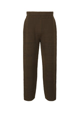 A product shot of the HOMME PLISSÉ ISSEY MIYAKE RUSTIC KNIT trousers in brown (44).