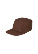 A product shot of the HOMME PLISSÉ ISSEY MIYAKE PLEATS CAP hat in chocolate brown (45).