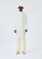 A model wears the HOMME PLISSÉ ISSEY MIYAKE BEANIE SCARF hat.