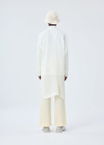 A model wears the HOMME PLISSÉ ISSEY MIYAKE BEANIE SCARF hat.