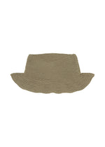 A detail shot of the HOMME PLISSÉ ISSEY MIYAKE BEANIE SCARF hat.