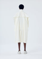 A model wears the HOMME PLISSÉ ISSEY MIYAKE FRESHEN coat.