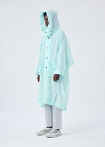 A model wears the HOMME PLISSÉ ISSEY MIYAKE KITE COAT coat.