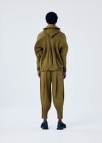 A model wears the HOMME PLISSÉ ISSEY MIYAKE CASCADE jacket.