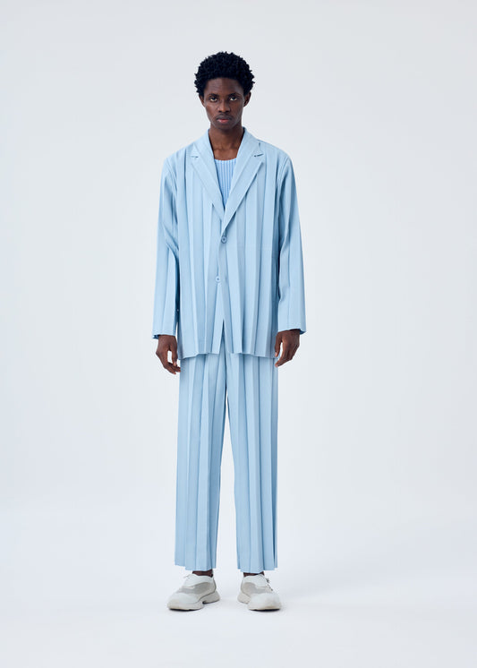 A model wears the HOMME PLISSÉ ISSEY MIYAKE EDGE ENSEMBLE jacket.