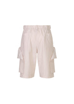 A detail shot of the HOMME PLISSÉ ISSEY MIYAKE FRESHEN trousers.