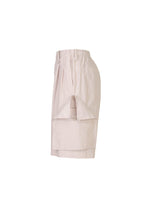 A detail shot of the HOMME PLISSÉ ISSEY MIYAKE FRESHEN trousers.