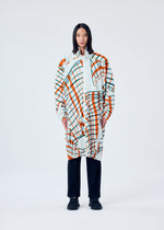 A model wears the HOMME PLISSÉ ISSEY MIYAKE WINDSWEPT PLAID coat.