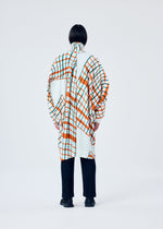 A model wears the HOMME PLISSÉ ISSEY MIYAKE WINDSWEPT PLAID coat.