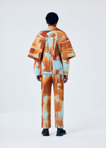 A model wears the HOMME PLISSÉ ISSEY MIYAKE WIND WALK jacket.