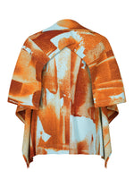 A detail shot of the HOMME PLISSÉ ISSEY MIYAKE WIND WALK jacket.