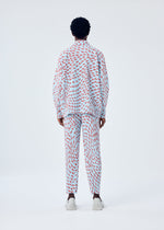 A model wears the HOMME PLISSÉ ISSEY MIYAKE WIND SPEED jacket.