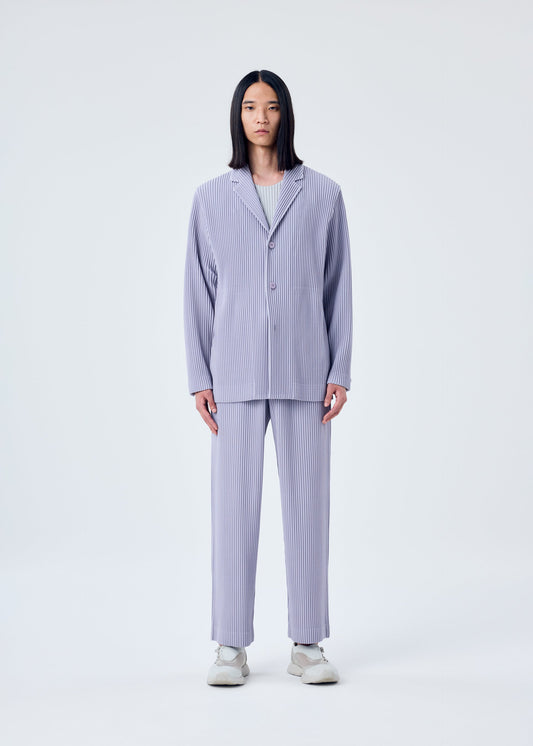 A model wears the HOMME PLISSÉ ISSEY MIYAKE TAILORED PLEATS 2 jacket.
